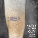 Fine line tattoo of a Lanzarote patch, created at Lanza Tattoo in Puerto del Carmen.