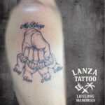 Black and grey praying hands tattoo, Family, created at Lanza Tattoo in Puerto del Carmen.